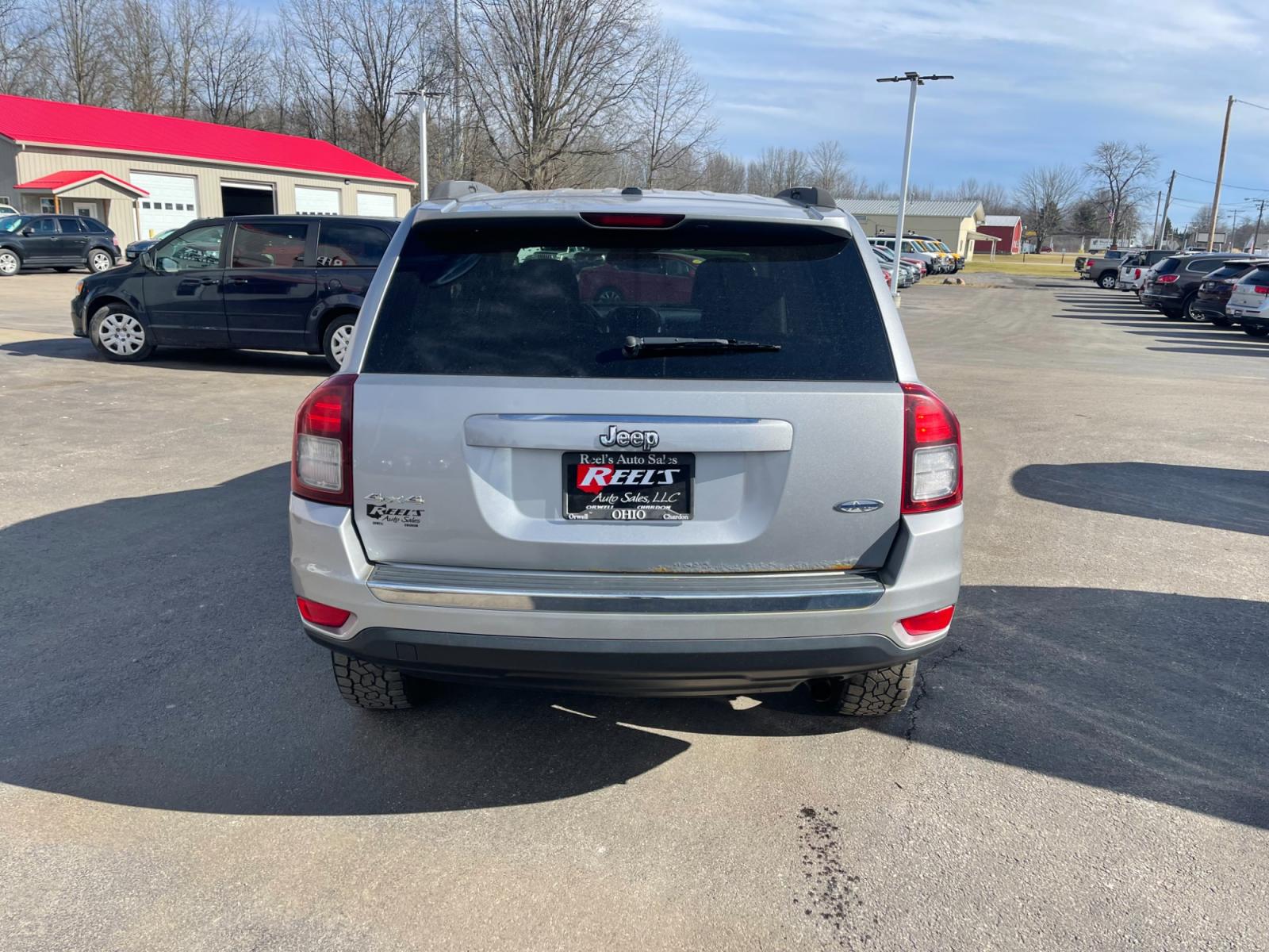 2015 Silver /Black Jeep Compass High Altitude 4WD (1C4NJDEB0FD) with an 2.4L I4 DOHC 16V engine, 6 Speed Automatic transmission, located at 547 E. Main St., Orwell, OH, 44076, (440) 437-5893, 41.535435, -80.847855 - This 2015 Jeep Compass High Altitude 4WD comes with several premium features designed for comfort, convenience, and performance. These include heated leather seats for comfort during colder days, a power sunroof that adds an airy, open feeling to the cabin, a power driver's seat to find the perfect - Photo #8